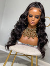 Glueless long curly wig providing luxurious, bouncy curls with ponytail 