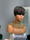 Glueless tapered pixie wig tailored for African American women, featuring a chic tapered cut.